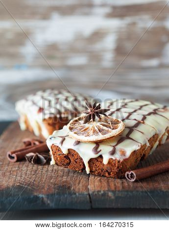 Fruitcake Decorated With White And Dark Chocolate