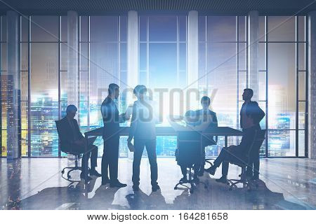 Businessmen Meeting In Skyscraper