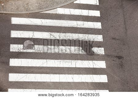 Safety on traffic concept. Urban city pedestrian zebra crossing view from top.