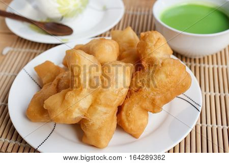 Chinese bread stick or chinese donut and pandan coconut custard dip