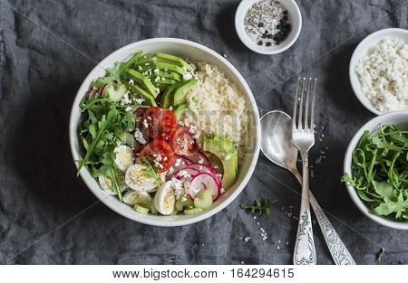 Couscous and vegetables bowl. Healthy diet vegetarian food concept. Top view