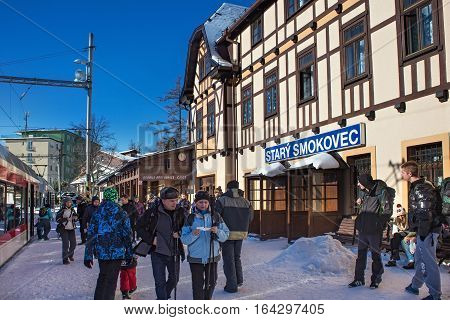 SLOVAKIA STARY SMOKOVEC - JANUARY 06 2015: Rush hour at railway station Stary Smokovec in High Tatras mountains. Is a popular resort for skiing and hiking. And junction of the Tatra Electric Railway