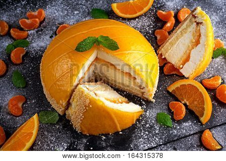 Orange Cake witch mousse, Mandarin saucea and fruit.