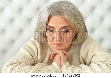 Portrait of a upset mature woman, close up