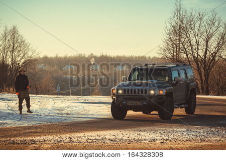The river Tosno, Leningrad oblast, Russia - January 01, 2017, H3 Hammer on the shore of the river, the Hummer H3 is a compact SUV produced by GM
