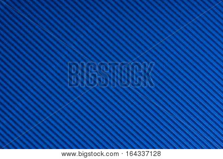 Striped blue embossed paper. Colored paper. Livid texture background