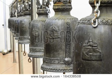 Closeup Row Of Bells In Buddhist Temple In Thailand.