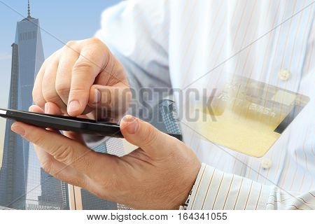 Close up of man using smartphone on urban background