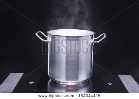 From the pot goes to the steam cooking surface.