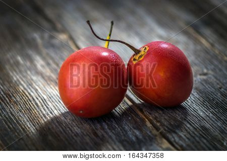 Fresh Fruit Tamarillo On Wooden Background