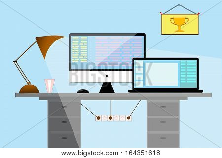 Workplace in office. Computer mono block and a laptop on the table