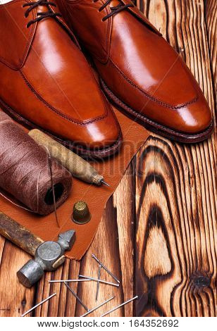 Fashion Derby Shoes Handmade And Shoemaker Tools Awl, Nails, Skien Of Thread .wooden Background.copy