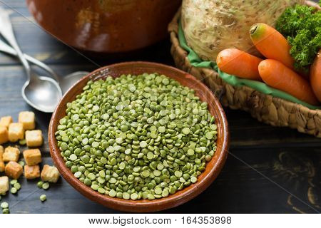 Ingredients for dried split pea vegetarian soup - carrot celery root onion parsley