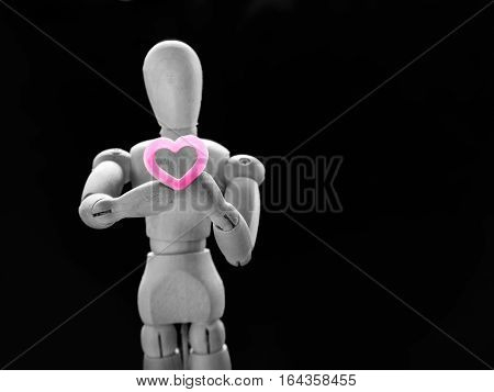 Still Life Wooden Puppet And Pink Heart.