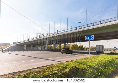 Elevated road across the multilane highway in Russia
