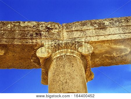 Ionic Coumn Oval Plaza Ancient Roman City Jerash Jordan. Jerash came to power 300 BC to 100 AD and was a city through 600 AD. Not conquered until 1112 AD by Crusaders. Famous Trading Center. Most original Roman City in the Middle East.