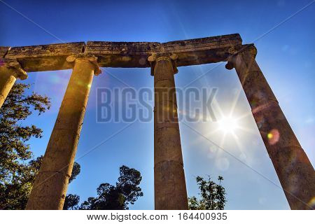 Ionic Columns Sun Oval Plaza Ancient Roman City Jerash Jordan. Jerash came to power 300 BC to 100 AD and was a city through 600 AD. Not conquered until 1112 AD by Crusaders. Famous Trading Center. Most original Roman City in the Middle East.