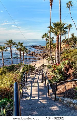 Heisler Park walkway overlooking the coastline cliffs of Laguna Beach, California in winter.