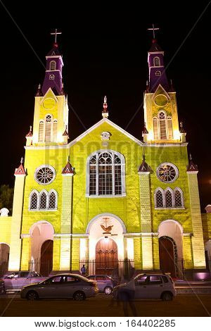 CASTRO CHILE - FEBRUARY 5 2016: The facade of the Church of San Francisco which was declared UNESCO World Heritage in 2000. The church is located at the Plaza de Armas main square in the center of Castro the capital of Chiloe Archipelago.