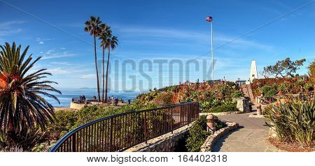 Heisler Park walkway overlooking the coastline cliffs of Laguna Beach, California in winter.