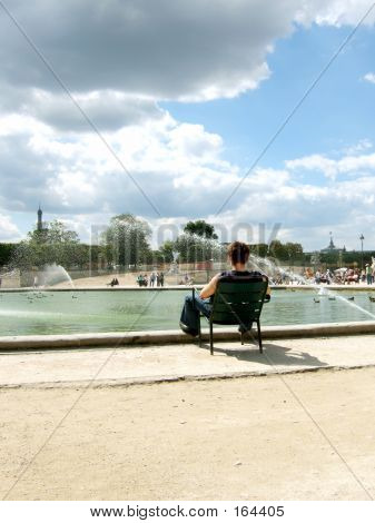 Man Reading In Paris