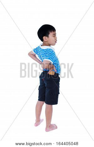 Asian Child Rubbing The Muscles Of His Lower Back. Isolated On White Background.
