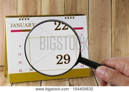 Magnifying Glass In Hand On Calendar You Can Look Twenty-nine Day Of Monthfocus Number Twenty-nine I