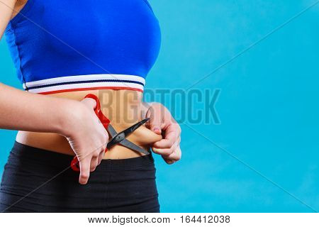 Woman Pinching Waist For Skin Fold Test