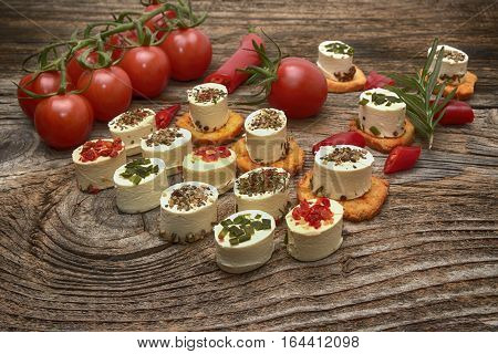 crunchy baguette slices with cream cheese and herbs