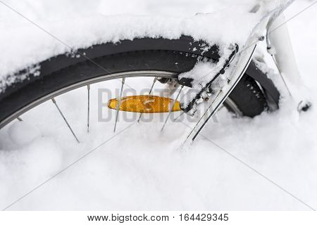 Bike Covered With Fresh Snow. Parked Bicycle Detail Covered With Winter Snow. The End Of Biking Seas