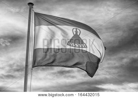 In The Cloudy Sky Waving Flag
