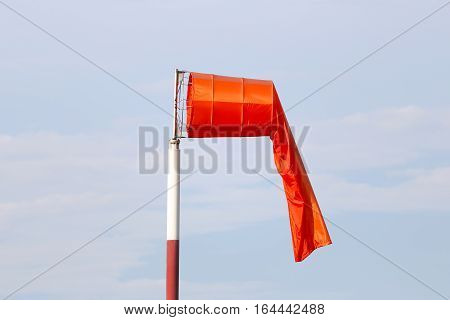 Wind sock of equipment check the wind blow direction in day time and no wind blow on overcast sky cloudy.