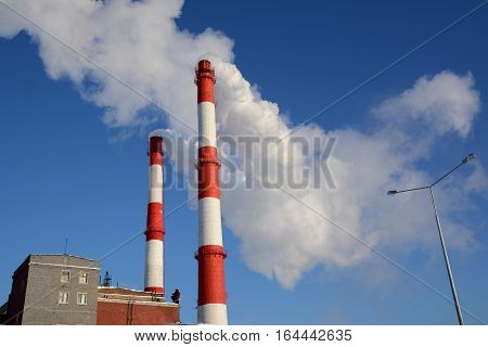 The smoke from the chimneys of thermal power plan.