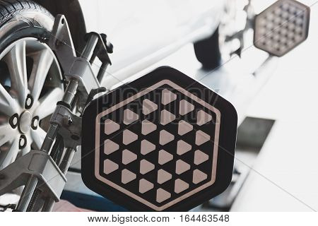 Car Wheel Fixed With Computerized Wheel Alignment Machine Clamp