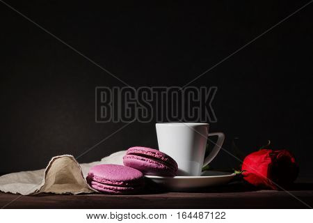 Coffee And Macaroons On Early Morning Breakfast Table, Dark Tone