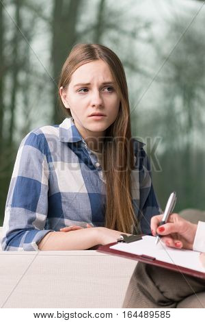 Worried Teenage Girl During Psychotherapy