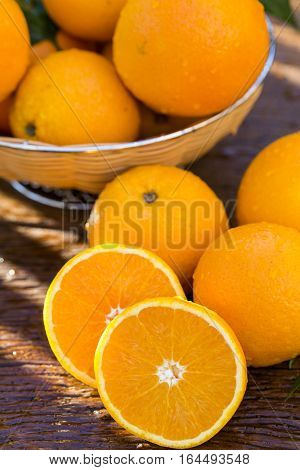 Sweet Fresh Oranges In Natural Light On Old Wood