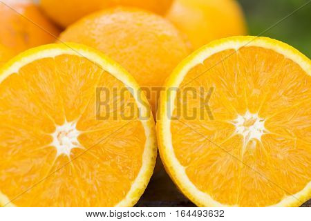 Sweet Fresh Oranges In Natural Light On Old Wood