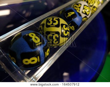 BUCHAREST ROMANIA - December 30 2015: Image of lottery balls during extraction of the winning numbers before the New Year.