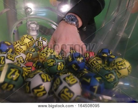 BUCHAREST ROMANIA - December 30 2015: Image of lottery balls during extraction of the winning numbers before the New Year.