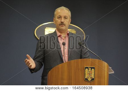 Bucharest Romania 5 December 2015: Romanian Vice Prime Minister and Minister of Regional Development and Public Administration Vasile Dincu speaks during a press conference at Bucharest Headquarters.