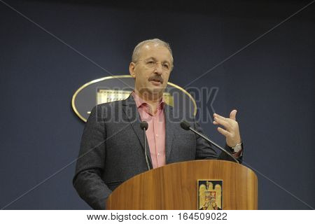 Bucharest Romania 5 December 2015: Romanian Vice Prime Minister and Minister of Regional Development and Public Administration Vasile Dincu speaks during a press conference at Bucharest Headquarters.