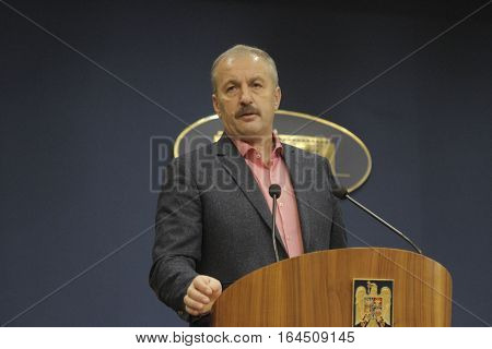 Bucharest Romania 5 December 2015: Romanian Vice Prime Minister and Minister of Regional Development and Public Administration Vasile Dincu speaks during a press conference at Bucharest Headquarters.