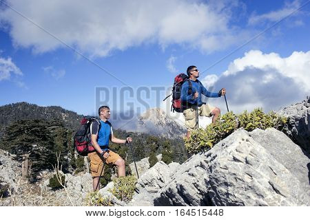Hiking in the mountains in the summer on a sunny day.