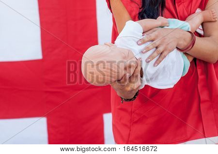 Demonstration Of First Aid Rebenkku With Choking