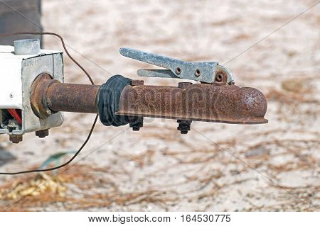 clipping Trailer safety connector . rusty hook for towing