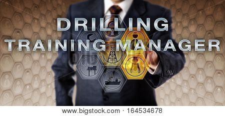 Male recruiter in blue suit is touching DRILLING TRAINING MANAGER on an interactive virtual computer monitor. Oil and gas industrial job metaphor for a mentoring role in petroleum engineering.