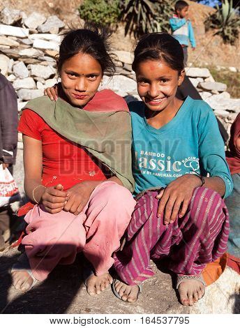 KOLTI VILLAGE WESTERN NEPAL 3rd DECEMBER 2013 - two nepalese children young girls in western Nepal near Kolti village