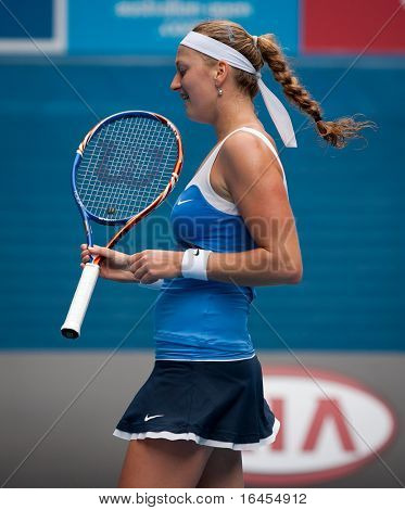 MELBOURNE - 26 stycznia: Petra Kvitova Republiki Czeskiej w jej straty ćwierćfinał Vera Zvonar