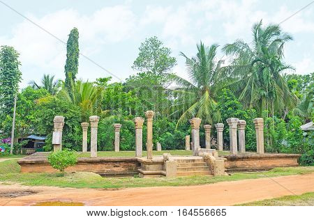 The ruins of building with preserved carved pillars at Jetavana Vihara Anuradhapura Sri Lanka.
